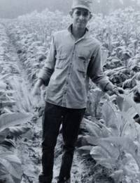 Nick Chestnut in tobacco field
