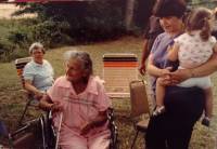 Alice in pink, her daughter in law, Margaret in stripes, her grandaughter Sue Beth, standing, daughter of Shirley Chestnut Rober