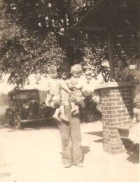 William Hardee holding Bob Connor and twin